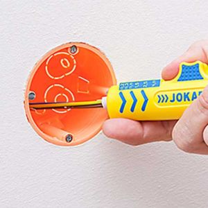 JOKARI Couteau à dénuder et dégainer - image du produit avec une boîte d'encastrement